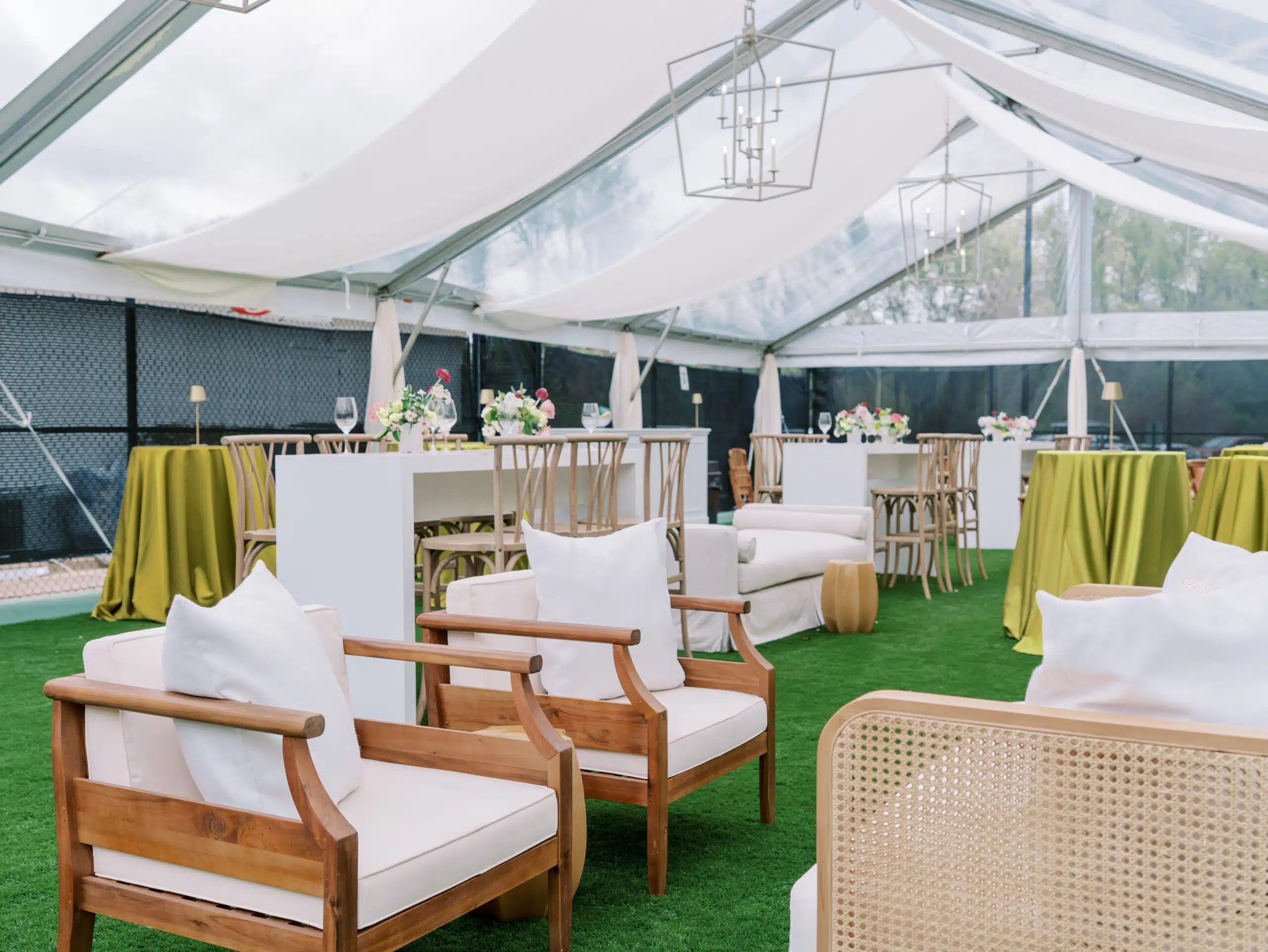 Elegant indoor event with seating arrangements.